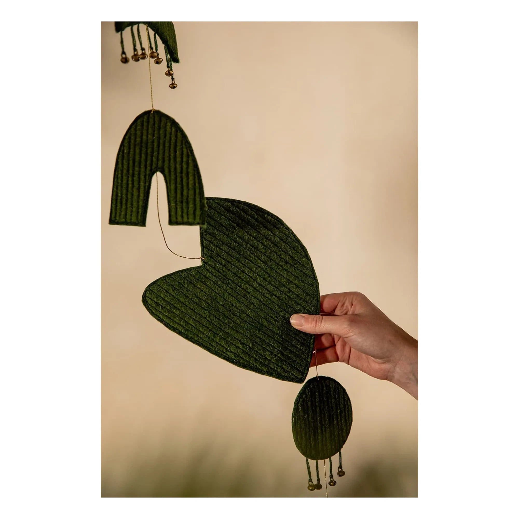 Muskhane - Quilted felt mobile | Dark green