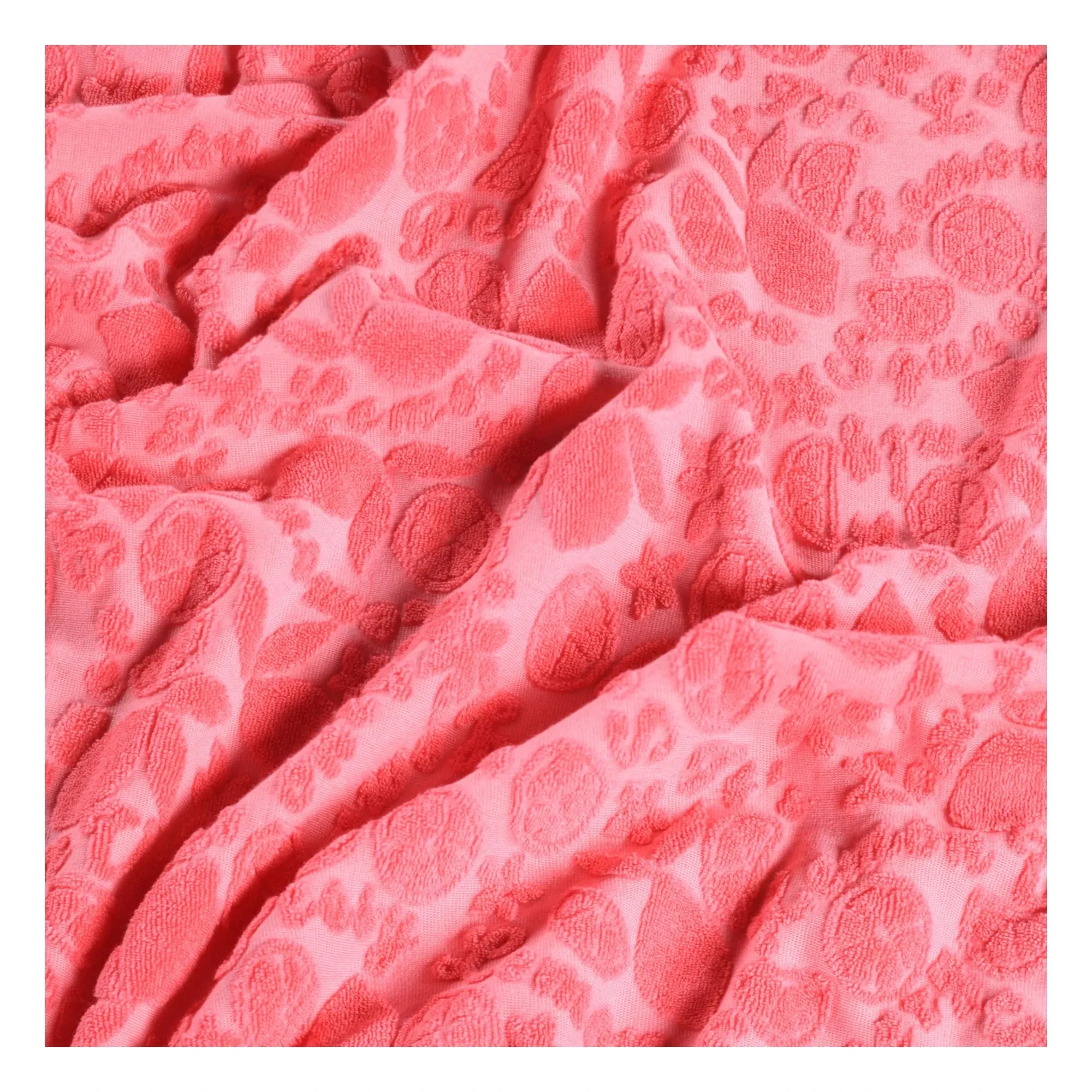 Molo - Dimpled Fruit Beach Towel | Coral