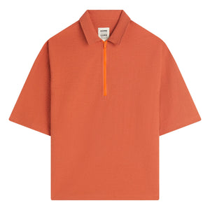 Homecore - Tajima Seer Zip Polo | Brick Red